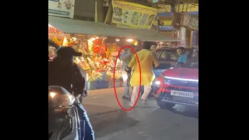 A man seen with a rifle on Kanpur road