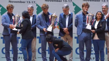 Indian chess player touches Magnus Carlsen's feet.