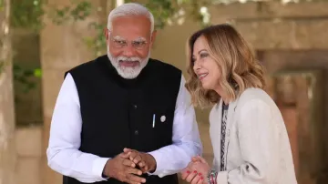 Prime Minister Narendra Modi is welcomed by Italian Prime Minister Giorgia Meloni at the G7 summit at a resort in southern Italy on June 14.