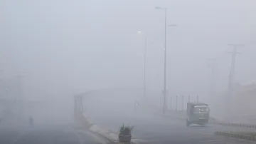 A view of vehicles amid smog along a highway in Multan in Pakistan