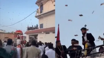 Family and Guests showering bundles of notes at the wedding procession in Uttar Pradesh's Siddhartnagar. 