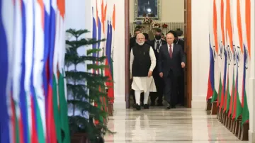 Russia's President Vladimir Putin attends a meeting with Prime Minister Narendra Modi in New Delhi, 