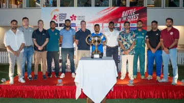 Captains of all participants pose with the Hong Kong Sixes trophy. 