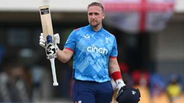 Liam Livingstone celebrates his hundred against West Indies.