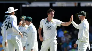 Pat Cummins celebrates a wicket.