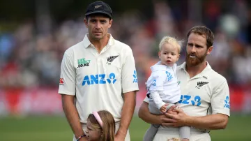 Tim Southee and Kane Williamson line up for New Zealand's national anthem.