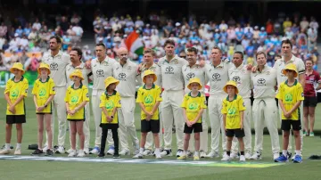 Australian players lined up for their national anthem.