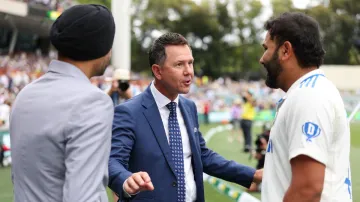 Ricky Ponting shares a moment with Rohit Sharma and Harbhajan Singh.