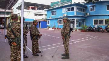 Security personnel keep vigil amid heightened security at the Bangladesh Assistant High Commission after protests erupted in Tripura over alleged attacks on Hindus in Bangladesh in Agartala