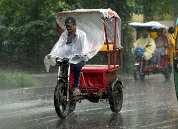 India Tv - Commuters faced a tough time in Delhi after heavy rains. India Tv - Commuters faced tough time in Delhi after heavy rains.