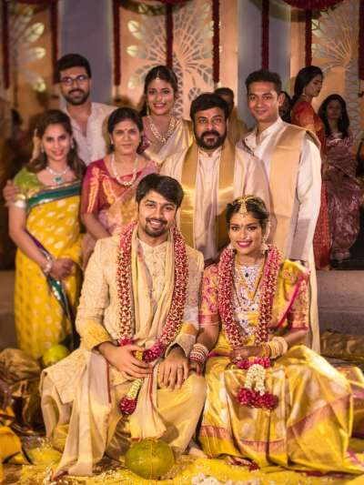 New Delhi: Telugu superstar and politician Chiranjeevi&rsquo;s second daughter Srija Konidela got married to her NRI fianc&eacute; Kalyan on Monday. The venue was the family&rsquo;s farmhouse near Devanahalli, Bengaluru.
The wedding, which was a strictly family affair, was attended by Srija&rsquo;s brother and Telugu actor Ram Charan Teja with his wife Upasana, her cousins Allu Arjun and Allu Sirish.
Srija and Kalyan were engaged some time back at Chiranjeevi&rsquo;s residence.
This is the second marriage of Srija. In 2007, she married her college friend Sirish Bharadwaj and has a daughter with him. The couple parted ways legally in 2011, after Srija claimed that her in-laws were torturing her for dowry. 
Now, she has stepped towards a new life with Kalyan. 
Check out the adorable pictures from the opulent wedding. 