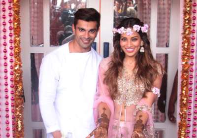 Bollywood actress Bipasha Basu is walking over the moon these days. The diva is all set to enter a new phase of her life as she is getting hitched with beau Karan Singh Grover on April 30.
Well, the soon-to-wed couple has been pretty excited about their D-Day. And the wedding celebrations of this amazing couple have finally begun.
Bipasha looks simply gorgeous and all smiles at her mehendi ceremony today.
The groom-to-be Karan Singh Grover too couldn&rsquo;t resist staying away from his bride.
The couple&rsquo;s mehendi ceremony was a complete star studded affair.
Here&rsquo;s a look at the inside pics of the event
