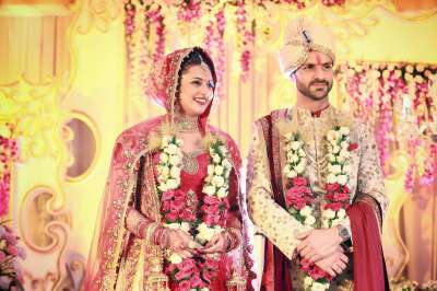 Television stars Divyanka Tripathi and Vivek Dahiya are the newly married couple of glamour world. On July 8, Divyanka and Vivek, both 31, married in a traditional ceremony in Bhopal , the actress' hometown. Here are the pictures from their wedding ceremony which are enthralling fans on social media. The adorable pictures post-wedding introduce Divyanka as the new bride and Vivek, the dashing groom, as her husband. The couple will continue the celebrations with a reception in Chandigarh, which is Vivek's hometown.