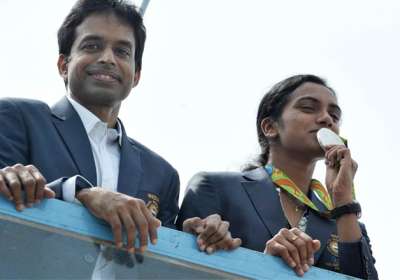 Amidst scenes of jubilation and a sense of pride, Olympics silver medallist P V Sindhu was on Monday accorded a rousing welcome on her arrival to home town and felicitated by Telangana government for her stupendous performance at Rio Games. The 21-year-old, who landed with her coach Pullela Gopichand, was received at Rajiv Gandhi International Airport by her parents P V Ramana and P Vijaya, some Telangana and Andhra Pradesh Ministers, amidst cheers from crowds.