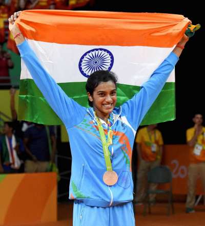 21 year old PV Sindhu has become the first Indian woman to win an Olympic silver medal. At the Rio Olympics she settled for the white medal after being beaten 21-19, 12-21, 15-21 by World No.1 Carolina Marin of Spain.
The Hyderbadi started on a positive note but after 3-3, the Spaniard dominated the proceedings and took four consecutive points to lead 7-3 and then 9-5.
Despite not being able to clench the gold medal, PV Sindhu won everyone&rsquo;s respect. Irrespective of the colour of the medal, Sindhu emerged the apple of the eye for every Indian citizen. Her game brought the nation to a standstill with people glued to television sets. 