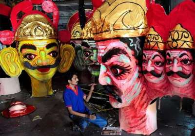 Dussehra or Vijaydashmi, the festival which marks the symbol of victory of good over evil, is being celebrated across the nation with great zeal. Click through for a glimpse of how the festival is being celebrated.
In pic an artist paints an effigy of Ravan in Nagpur.