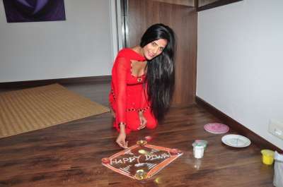 Bollywood actress Poonam Pandey celebrates Diwali at her home in Mumbai