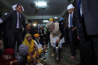 Prime Minister Narendra Modi today bowled us over with his down to earth attitude as he served langar at the Golden Temple in Amritsar.

He along with Afghanistan President Ashraf Ghani arrived in the holy town to attend the Heart of Asia conference and had a visit to the Golden Temple.

PM Modi also knelt and bowed five times before the Sikh Holy book and was honoured with a siropa.

Catch his heart winning gesture in pictures:
