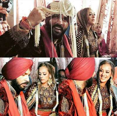 Cricketer Yuvraj Singh has finally ditched his bachelor tag as he tied the knot with Bollywood actress Hazel Keech yesterday in Punjab's Fatehgarh Sahib district.
The wedding was solemnized as per Sikh traditional 'Anand Karaj' at a gurudwara which was decorated for this grand occasion. Traditional 'dholis' and singers were present outside the gurudwara as part of the wedding celebrations.
Yuvraj-Hazel&rsquo;s wedding has been one of the much talked about weddings of the year and it was indeed a grand affair with entire cricket team marking its presence.
The couple will be hosting a grand wedding reception in Delhi on December 7.
Here&rsquo;s a look at the inside pics of Yuvraj-Hazel&rsquo;s wedding celebrations