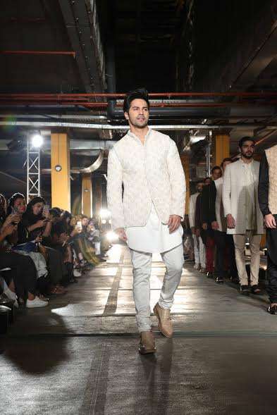 Varun Dhawan walked the ramp for designer Kunal Rawal. It is s very proud moment for me as a friend. Kunal is a big designer today, besides doing film he is big in the fashion industry as well,&quot; Varun said. 