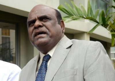 Facing arrest Justice Karnan becomes first HC judge to retire while still absconding India TV