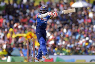 Niroshan Dickwella plays a shot during their first one-day international cricket match against India in Dambulla