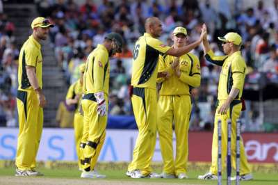 Australia spinner - Ashton Agar celebrates the dismissal of India's Manish Pandey with David Warner and captain Steve Smith applauds during the second ODI in Kolkata.