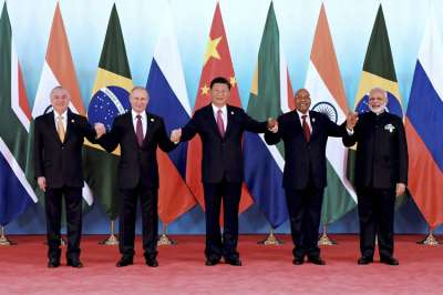 Brazilian President Michel Temer, Russian President Vladimir Putin, Chinese President Xi Jinping, South African President Jacob Zuma, and Indian Prime Minister Narendra Modi pose for a group photo at the BRICS Summit in Xiamen in southeastern China's Fujian Province