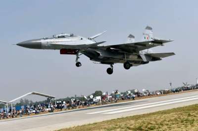A Su-30 MKI aircraft touches down on Lucknow-Agra Expressway during a drill conducted by Indian Air Force near Bangarmau in the Unnao district of Uttar Pradesh on Tuesday.