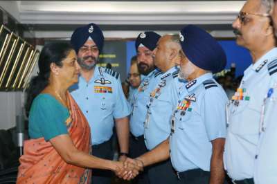 Union Defence Minister Nirmala Sitharaman interacting with IAF Commanders during a conference in New Delhi on Tuesday. The three-day-long IAF commanders conference is taking place amid an evolving regional security scenario and growing assertiveness by China in some parts of the Sino-India border. 