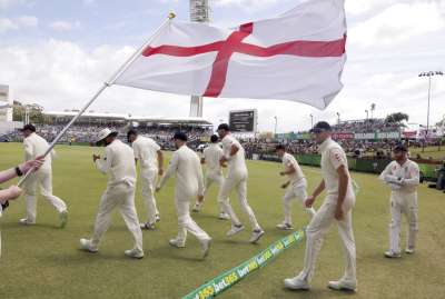 England is facing an innings defeat to Australia in the third Ashes cricket test on the crumbling WACA pitch Sunday. Facing a deficit of 259 runs, England's day was saved by rain as it finished on 132-4 with Dawid Malan 28 not out and Jonny Bairstow 14 not out taking the game into the fifth and final day. England needs to survive 95 overs over three sessions Monday to stop Australia from reclaiming the Ashes.