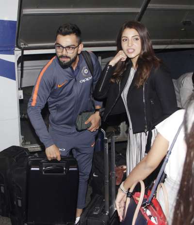 After hosting a grand reception in Mumbai, newlyweds Anushka Sharma and Virat Kohli left for South Africa for the cricketer&rsquo;s upcoming series. They were spotted at the Mumbai airport on Thursday along with the rest of the cricket team.