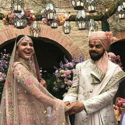 One of the most eligible bachelor of the country, Virat Kohli, who rules million hearts, tied the knot with the love of his life, actress Anushka Sharma in Italy. Celebrities from all walks of life are congratulating the couple and the pics from the wedding will make you believe that fairy tale exists. Checkout some adorable moments of the celebrations.