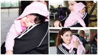 Soha Ali Khan was recently spotted at airport but this time she wasn't alone. The actress was carrying her daughter Inaaya Naumi Kemmu in her arms and it just made difficult for us to take our eyes off from them.

