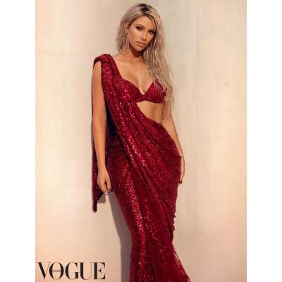 TV star Kim Kardashian has taken the internet by storm with her beautiful pictures from Vogue India photoshoot. The lady can be seen in Indian avatar as she donned a wine colour shimmery saree designed by Sabyasachi Mukherji.
