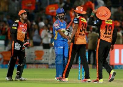 Sunrisers Hyderabad bowlers' impressive defense of modest totals continued as the visitors pulled off an 11-run win over Rajasthan Royals on a tricky pitch to claim the top spot in the Indian Premier League (IPL) in Jaipur on Sunday.