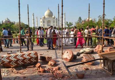 A pillar or minaret at the entry gate of the iconic Taj Mahal collapsed in heavy rains and thunderstorm which hit Agra early on Thursday. The pillar known as Darwaza-e-Rauza, which was 12-feet in height, came down crashing as winds reaching upto 100 km per hour lashed the city.&amp;nbsp;