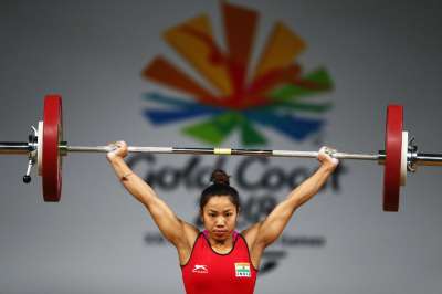 A record-smashing Mirabai Chanu and a perseverant P Gururaja claimed gold and silver respectively as weightlifters lived up to the pre-event hype by delivering opening-day medals for India while star badminton players added to the cheer by making a winning start in the 21st Commonwealth Games, here.