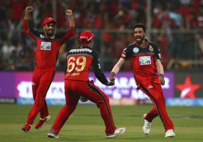 Royal Challengers Bangalore pacers blew away the Mumbai Indians' top order before shining in the death overs to set up a much-needed 14-run win, which kept them alive in the Indian Premier League Play-offs race, at the M Chinnaswamy stadium.