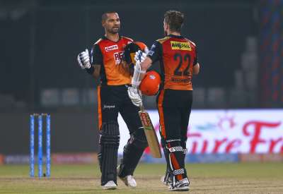 Shikhar Dhawan and Kane Williamson shared an unbeaten 176-run stand to overshadow a breathtaking hundred from Rishabh Pant as Sunrisers Hyderabad sailed into the Indian Premier League play-offs with a commanding nine-wicket victory over Delhi Daredevils at Feroz Shah Kotla.