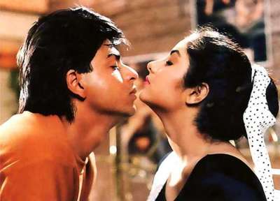 After impressing the audience with a TV show Fauji, Shah Rukh Khan set his foot in Bollywood with Divya Bharti and Rishi Kapoor-starrer Deewana. Ever since then, there was no stopping for this young boy with lob haircut and dimples. As he completes 26 years in Bollywood, let's trace his journey in B-town with 26 iconic pictures.&amp;nbsp;