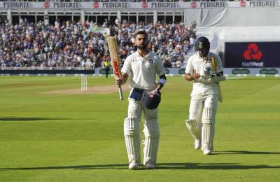 Virat Kohli took a giant stride towards exorcising the ghosts of 2014 with a masterful century as he singlehandedly pulled India out of the woods against England on an eventful second day of the first Test.