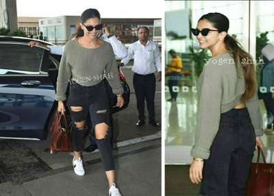 The Padmaavat actress Deepika Padukone knows all the art of grabbing attention with her style quotient and fashion sense. The diva was recently spotted at airport and she stunned in her airport look. Deepika was seen donning black ripped jeans and a military coloured crop top. Her neatly tied hair and black shades added to her style.