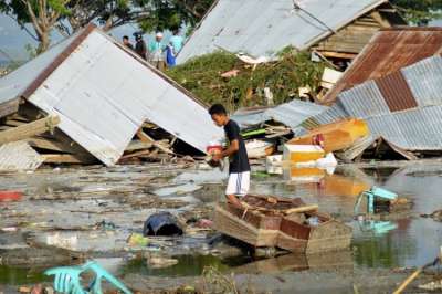 The death toll from Indonesia's quake and tsunami jumped to 384, the disaster agency said on Saturday, reported news agency AFP.