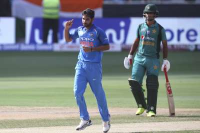 Bhuvneshwar Kumar and Jasprit Bumrah gave away just four runs and removed the two openers in the first five overs.