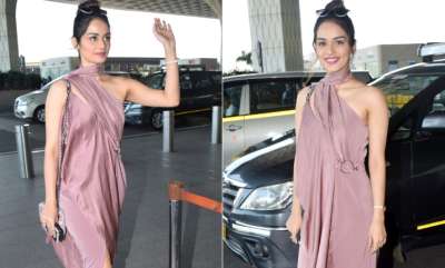 Miss World 2017 Manushi Chillar was spotted at Mumbai airport in a mauve thigh-high slit dress and she was looking ravishing as always.&amp;nbsp;