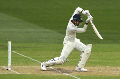 The sun took a break but India shone to stay ahead of Australia in the opening Test after sporadic rain intrusions, K L Rahul's enterprise and Cheteshwar Pujara's obduracy culminated in a 166-run lead.