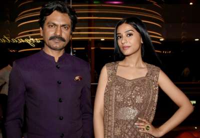 Thackeray Special Screening: Actors Nawazuddin Siddiqui and Amrita Rao spotted in their elegant outfits at the Mumbai screening of their upcoming biopic drama Thackeray.
