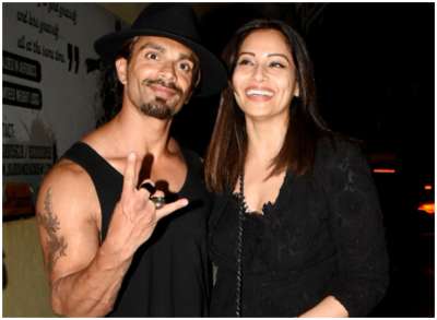 Bipasha Basu was all smiles as she posed with husband Karan Singh Grover at their movie date in PVR Juhu.