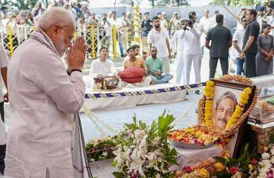 Prime Minister Narendra Modi pays homage to Goa Chief Minister Manohar Parrikar, who passed away battling pancreatic ailment, in Panaji.